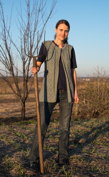 Female farmer  with spade - Фото, изображение