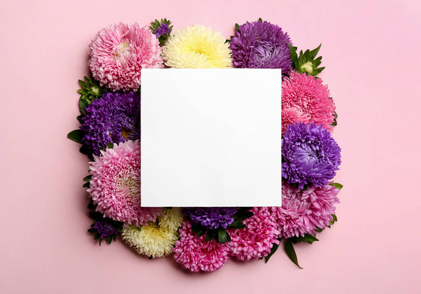 Flat lay composition with blank card and beautiful asters on pink background, space for text. Autumn flowers - Valokuva, kuva