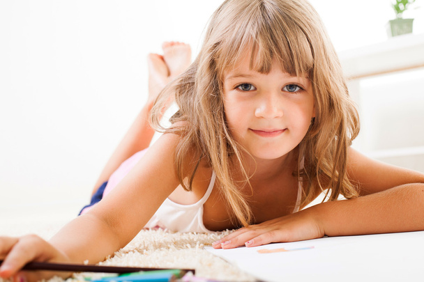 Little girl with color crayons - Photo, Image