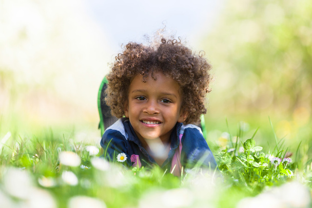 Cute african american little boy playing outdoor - Black people - Foto, immagini