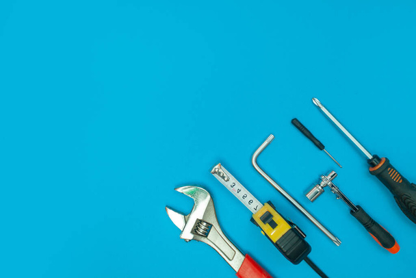 tools on isolated blue background - Фото, изображение