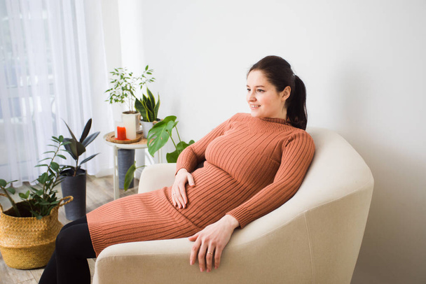 the happy young woman learned about her pregnancy - Фото, изображение