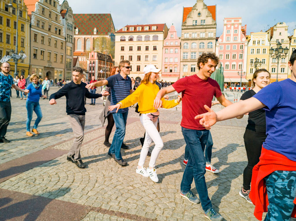 Wroclaw, Poland - March 31 2019  International Flashmob Day of Rueda de Casino and open event at market square - Zdjęcie, obraz
