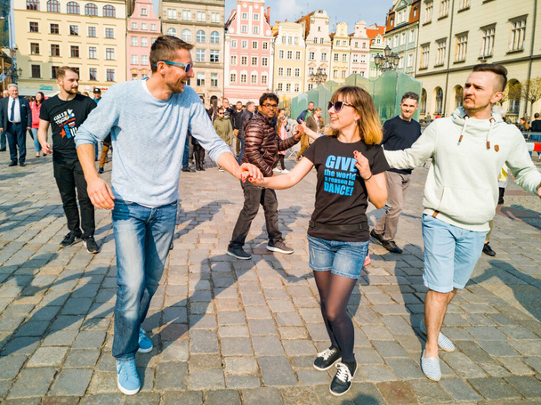 Wroclaw, Poland - March 31 2019  International Flashmob Day of Rueda de Casino and open event at market square - Fotografie, Obrázek