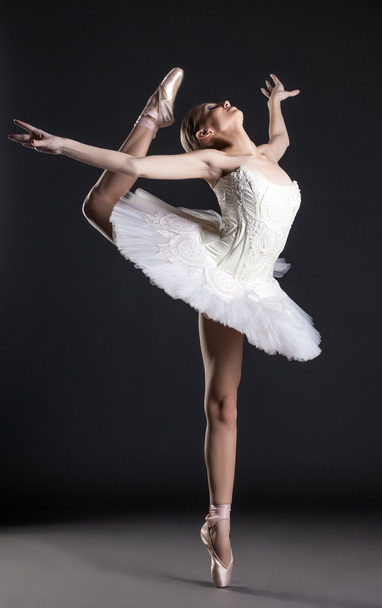 Image of flexible cute ballerina dancing in studio - Zdjęcie, obraz