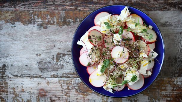 Healthy salad with radishes and feta cheese. Radish salad with microgreens. Keto friendly recipe. - Valokuva, kuva