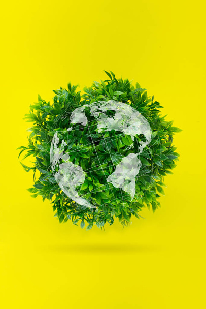 World environment day. Ecological Concept-A globe of Grass on a yellow background. Environmentally friendly planet - Fotoğraf, Görsel