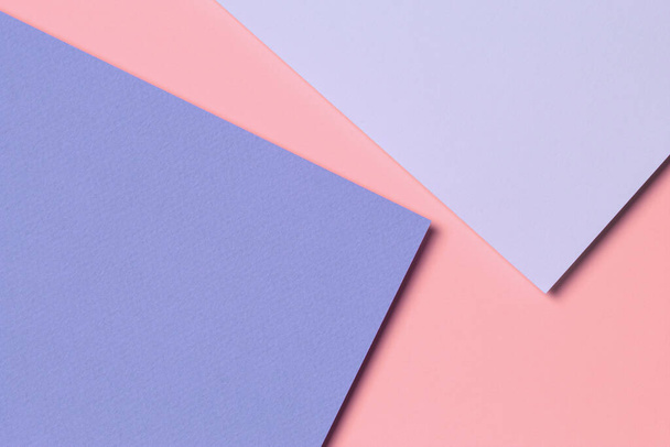 Abstract colored paper texture background. Minimal geometric shapes and lines in light blue, pastel pink, purple colors - Φωτογραφία, εικόνα