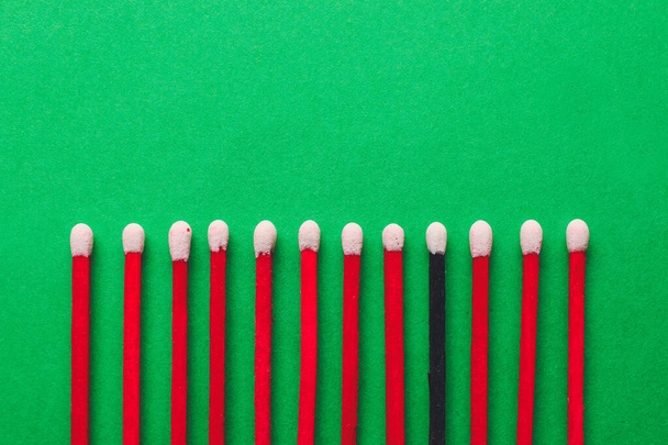 Matches on color background. Concept of uniqueness - Photo, Image