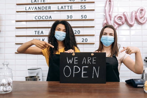 welcome open signboard woman waitress barista owner small business - Photo, Image