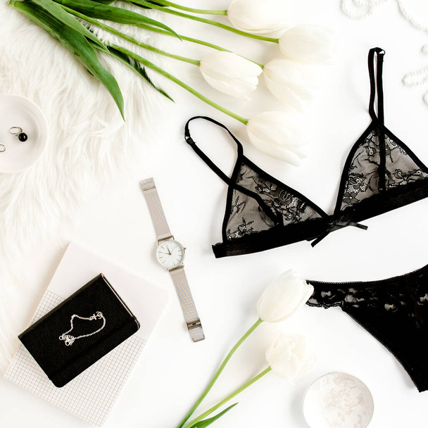Flat lay stylish, sexy, black lingerie, accessories on a white background. Top view.  - Φωτογραφία, εικόνα