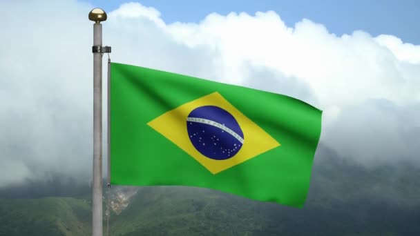 Brasilian lippu heiluu tuulessa vuorella. Lähikuva Brasilian banneri puhaltaa, pehmeä ja sileä silkki. Kankaalla kangas rakenne aliluutnantti tausta. Käytä sitä kansallisen päivän ja maan otteeseen käsite. Dan - Materiaali, video