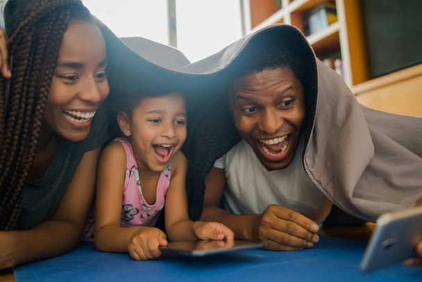 Family taking a selfie with phone. - Fotó, kép