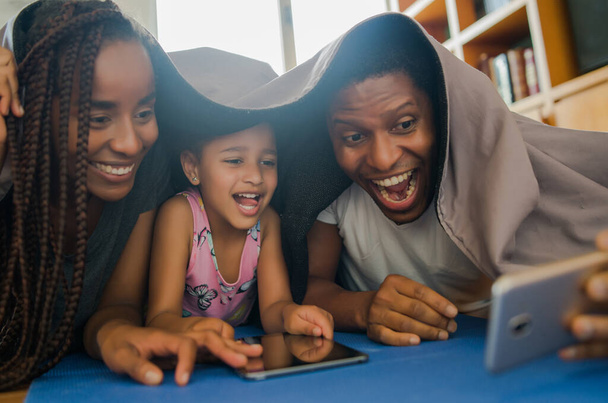 Family taking a selfie with phone. - Фото, зображення