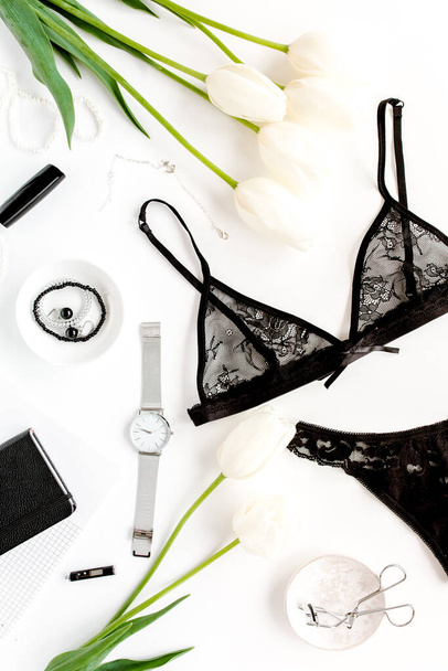 Flat lay stylish, sexy, black lingerie, accessories on a white background. Top view.  - Zdjęcie, obraz