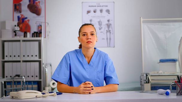 Authentic experienced woman nurse talking to camera - Photo, image