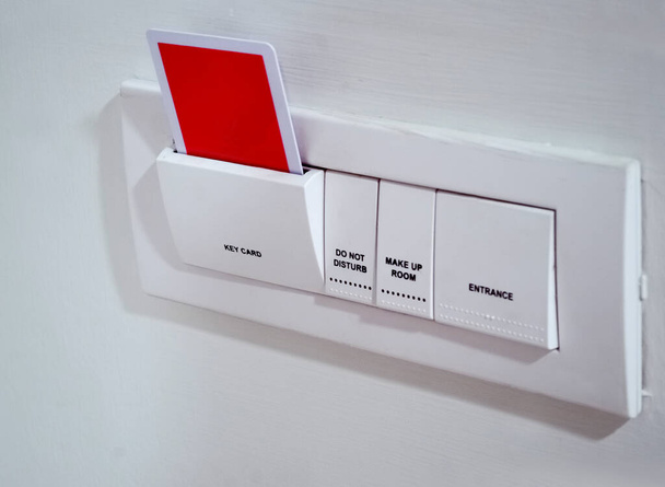 Keycard socket, entrance light, privacy in hotel - Photo, Image