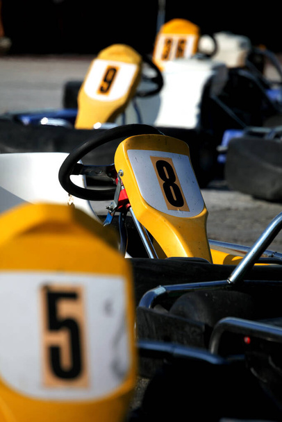 A vertical shot of kart racing cars - Zdjęcie, obraz