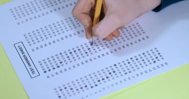 Exam. Filling in the test with a pencil. - Footage, Video