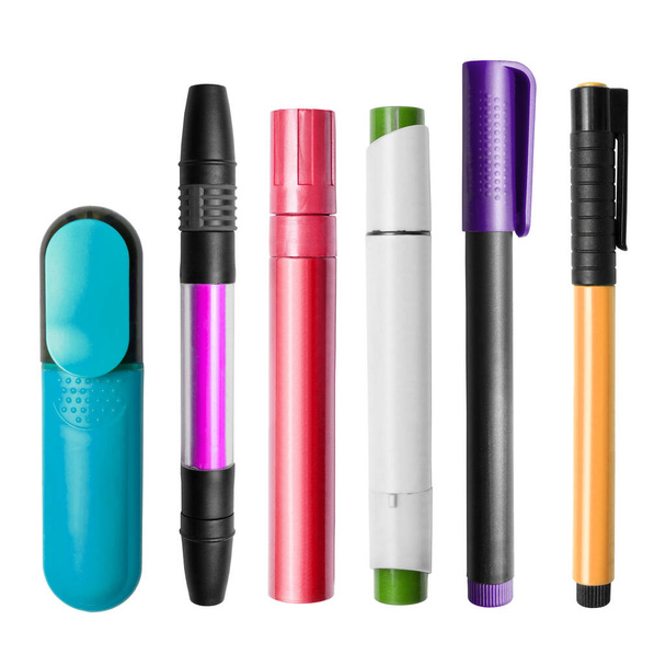 Group of colorful markers and pens isolated over white - Foto, afbeelding