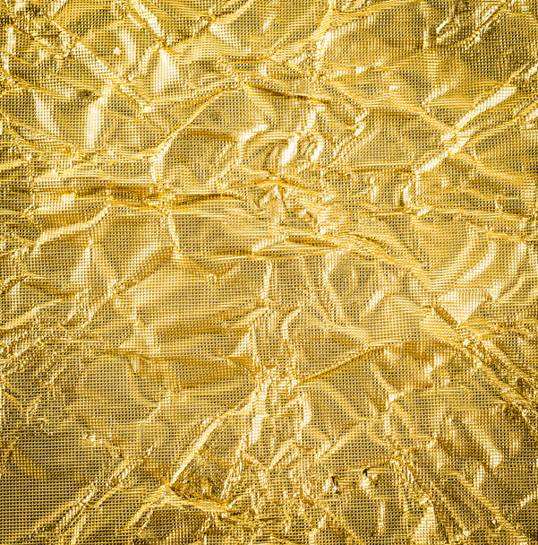gold paper crumpled texture background - Photo, Image