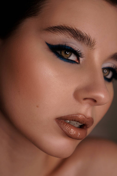 Beauty portrait with professional blue makeup. Fashion portrait - Φωτογραφία, εικόνα
