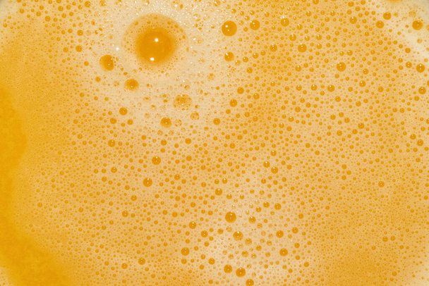 Sumo de laranja fresco com bolhas. Textura Fundo - Foto, Imagem
