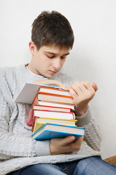 Teenager reads a Books - Фото, зображення
