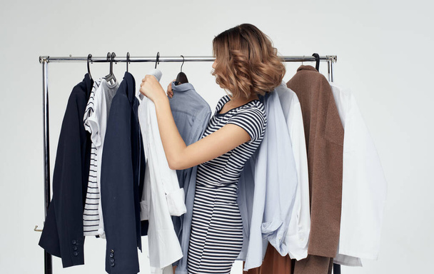 Wardrobe fashion clothes shirts women shopping striped t-shirt model - Foto, afbeelding