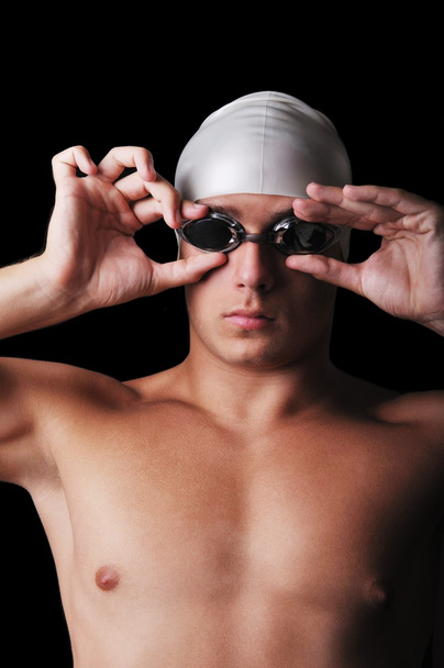 mięśni mężczyzna pływak na czarnym tle - Zdjęcie, obraz