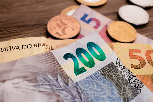 Real currency, money from Brazil. Money, Reais, Brazilian Real, Brazil. A group of brazilian banknotes in closeup. - Photo, image