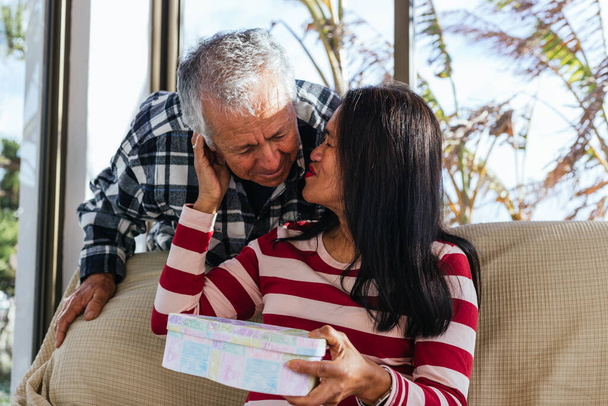 Old couple in valentines day with lovely presents  - Photo, Image