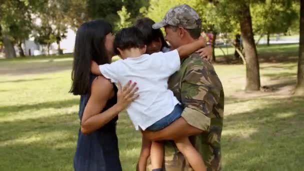 Happy children celebrating military dads returning - Footage, Video