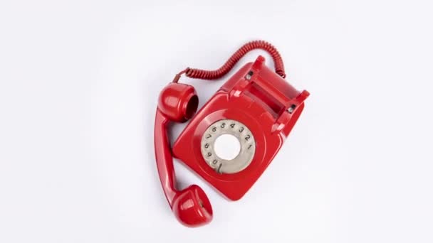 A red classic rotary telephone zoooming out - Footage, Video