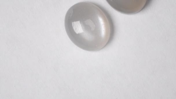 Moonstone gemstones on a turn table - Footage, Video