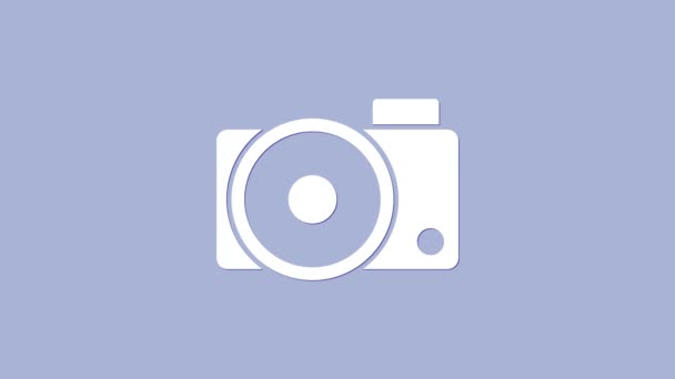 Ikona bílé foto kamery izolované na fialovém pozadí. Ikona fotoaparátu. Grafická animace pohybu videa 4K - Záběry, video