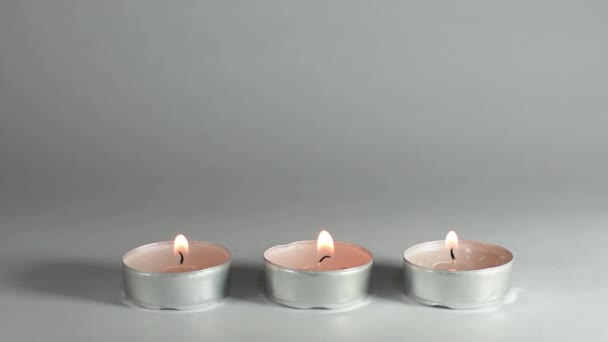 Cinemagraph with three candles next to each other in winter time - Footage, Video