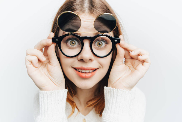 cheerful woman with glasses smile fashion close-up - 写真・画像