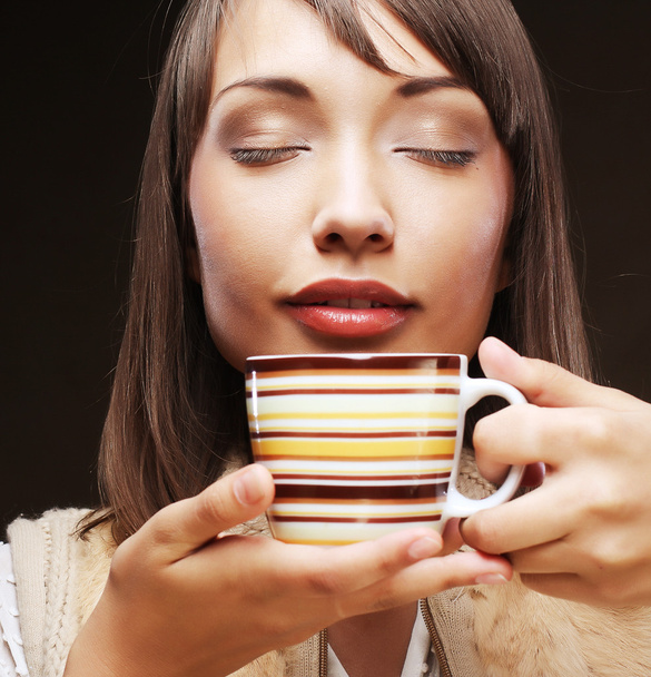 Woman with an aromatic coffee - Fotó, kép