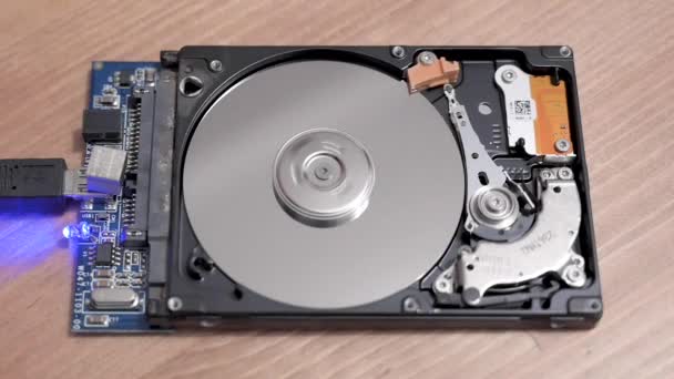 4k video of the read and write head of a hard drive while it is working  - Footage, Video