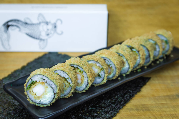 Perfect sushi, traditional Japanese cuisine. Delicious hot sushi - Photo, Image
