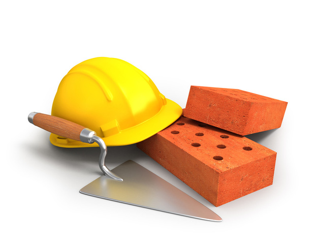 Bricks, trowel and a yellow plastic helmet - Photo, Image