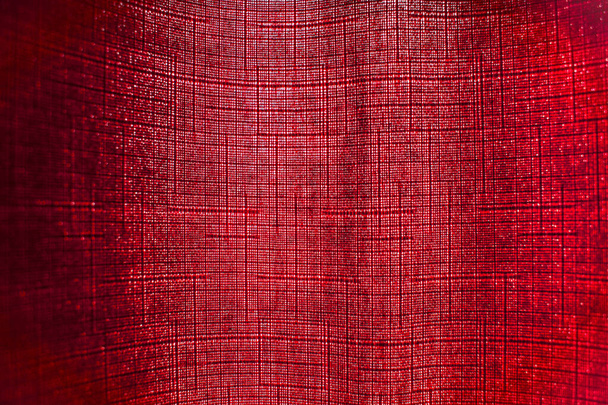 A red fabric with an interesting pattern - Photo, Image