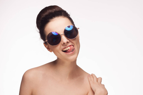 attractive woman with naked shoulders sunglasses fashion isolated background - Photo, Image