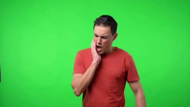 Man with toothache. Chroma green background. - Footage, Video