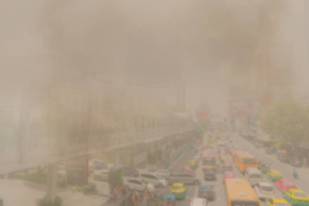 Pm2.5 contaminación del polvo en las ciudades y los coches desenfoque - Foto, Imagen