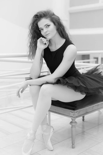 Black and white photo of flexible slender young girl ballerina. BW - Zdjęcie, obraz