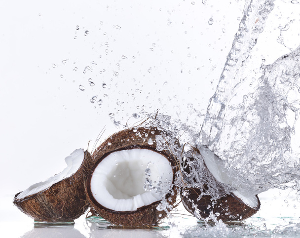 Coconuts with water splash - Fotoğraf, Görsel