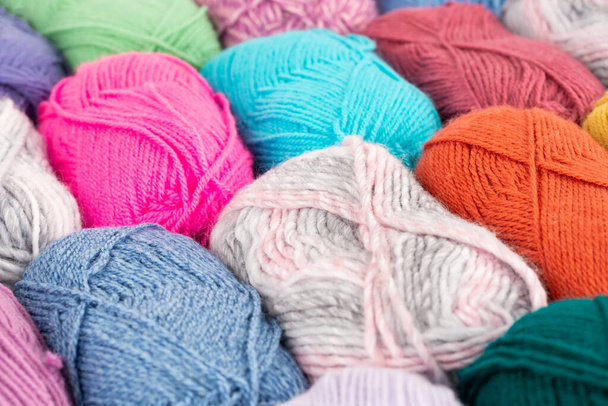 The stack of colorful knitting yarn clews close up picture. - Photo, Image