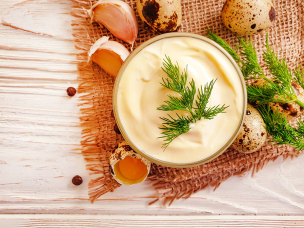homemade mayonnaise, quail eggs on wooden background - Photo, Image